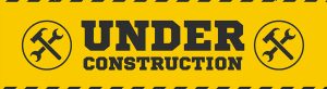 Bild in gelb mit aufschrift under construction. Farben-Frikell WTB Webshop Umstellung